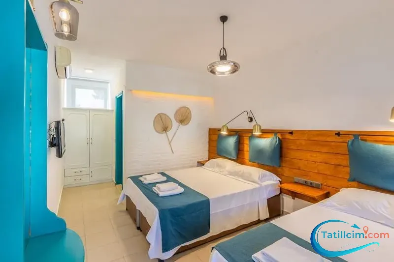 tatilcim.com Avlu Otel Palamutbükü Triple Room ( Bahçe manzaralı) 